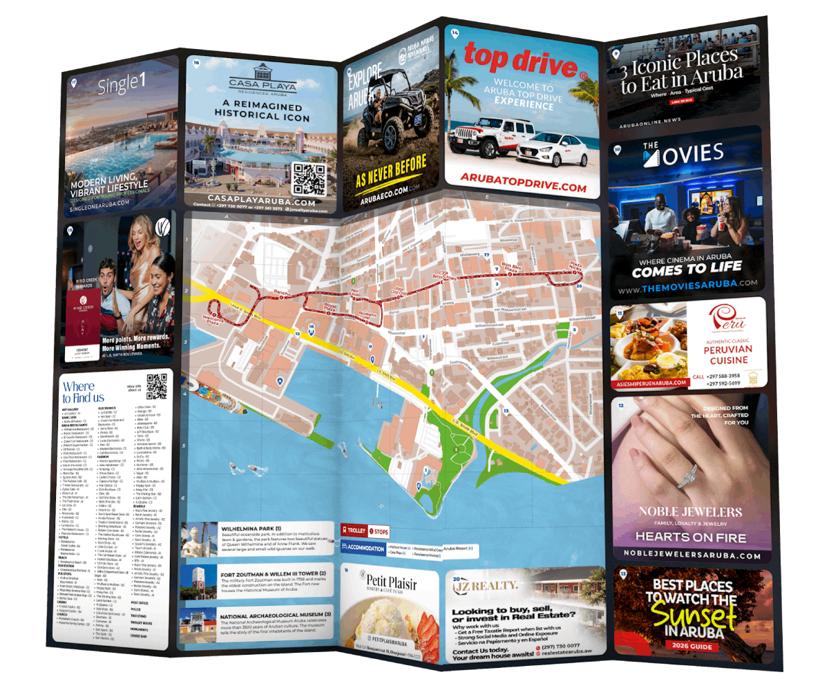 Aruba Discovery fold-out tourist map featuring local business advertisements, attractions, restaurants, and visitor information in Aruba